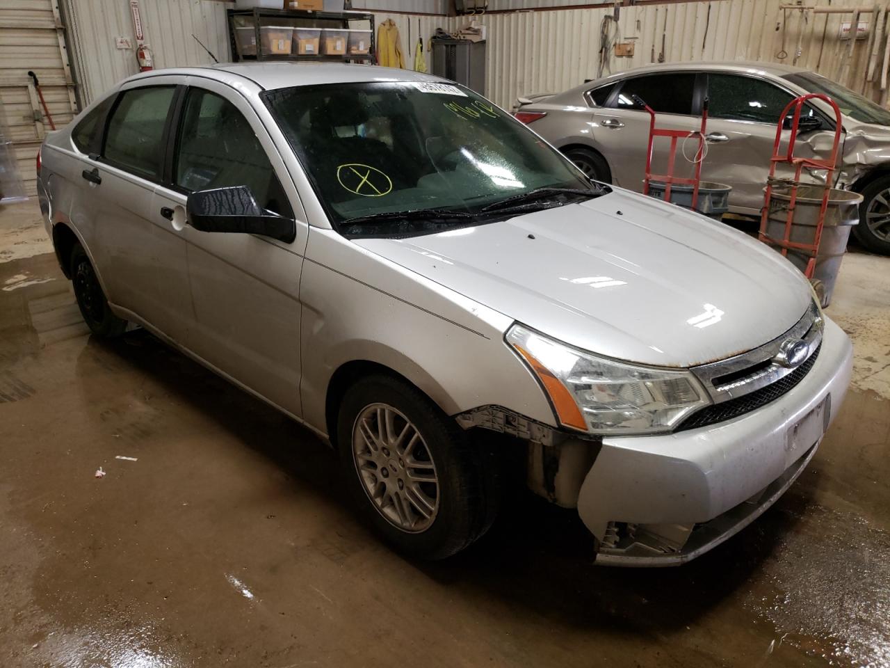 FORD FOCUS SE 2010 with VIN 1FAHP3FNXAW222293 - Photo from auction