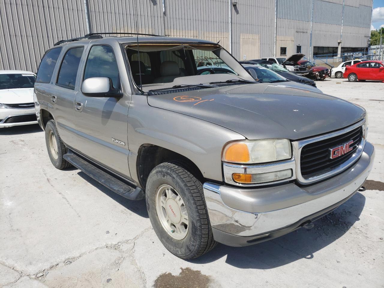 GMC YUKON 2002 with VIN 1GKEK13ZX2R149891 - Photo from auction