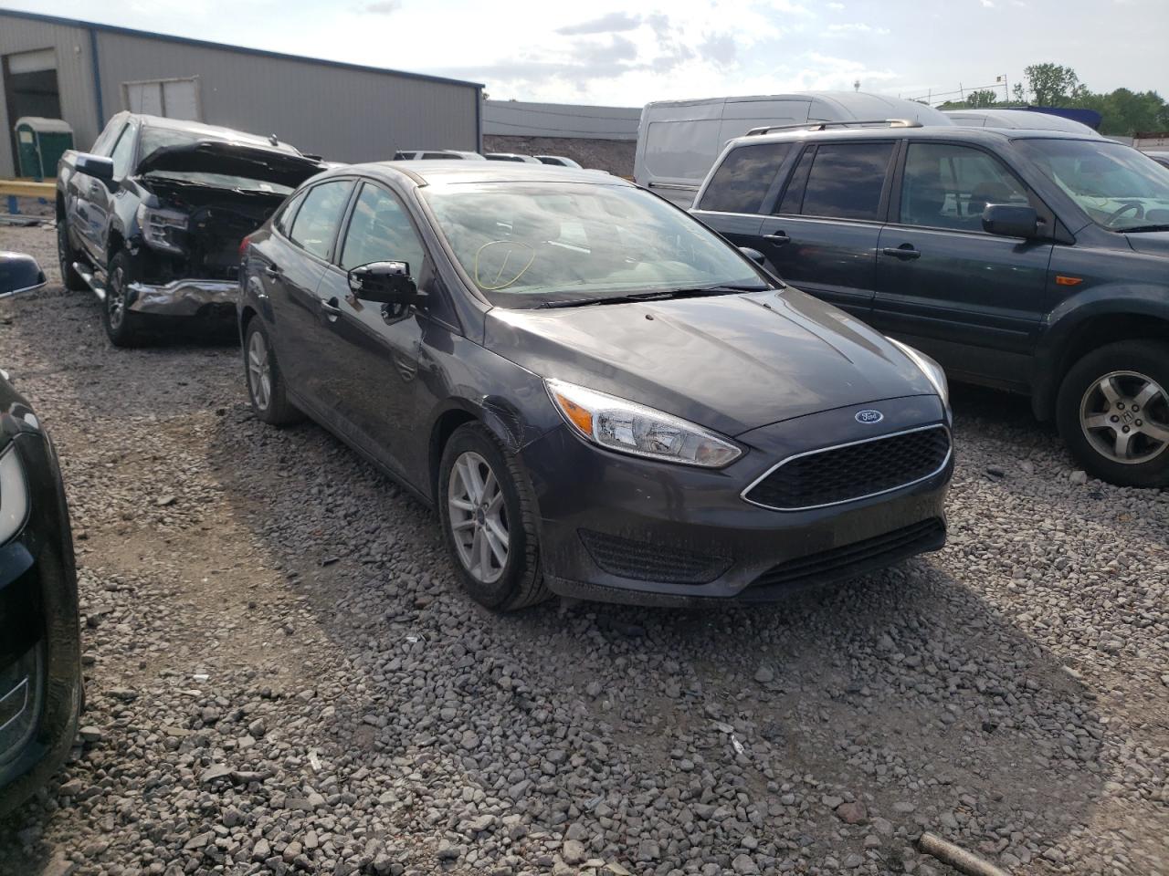 FORD FOCUS SE 2018 with VIN 1FADP3F27JL264717 - Photo from auction
