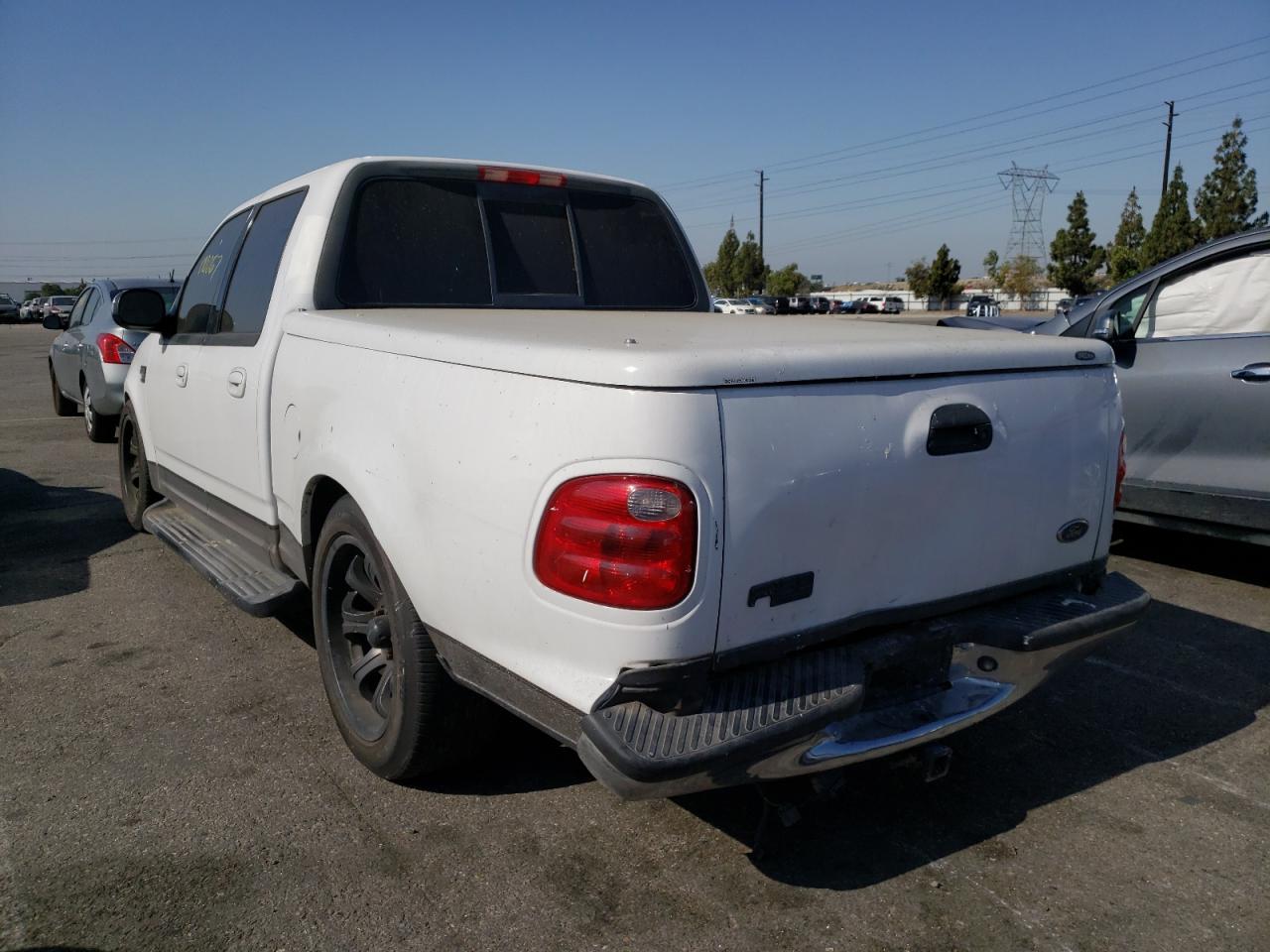 Photo 3 from auction – 2001 FORD F150 SUPER with VIN 1FTRW07L61KB66552