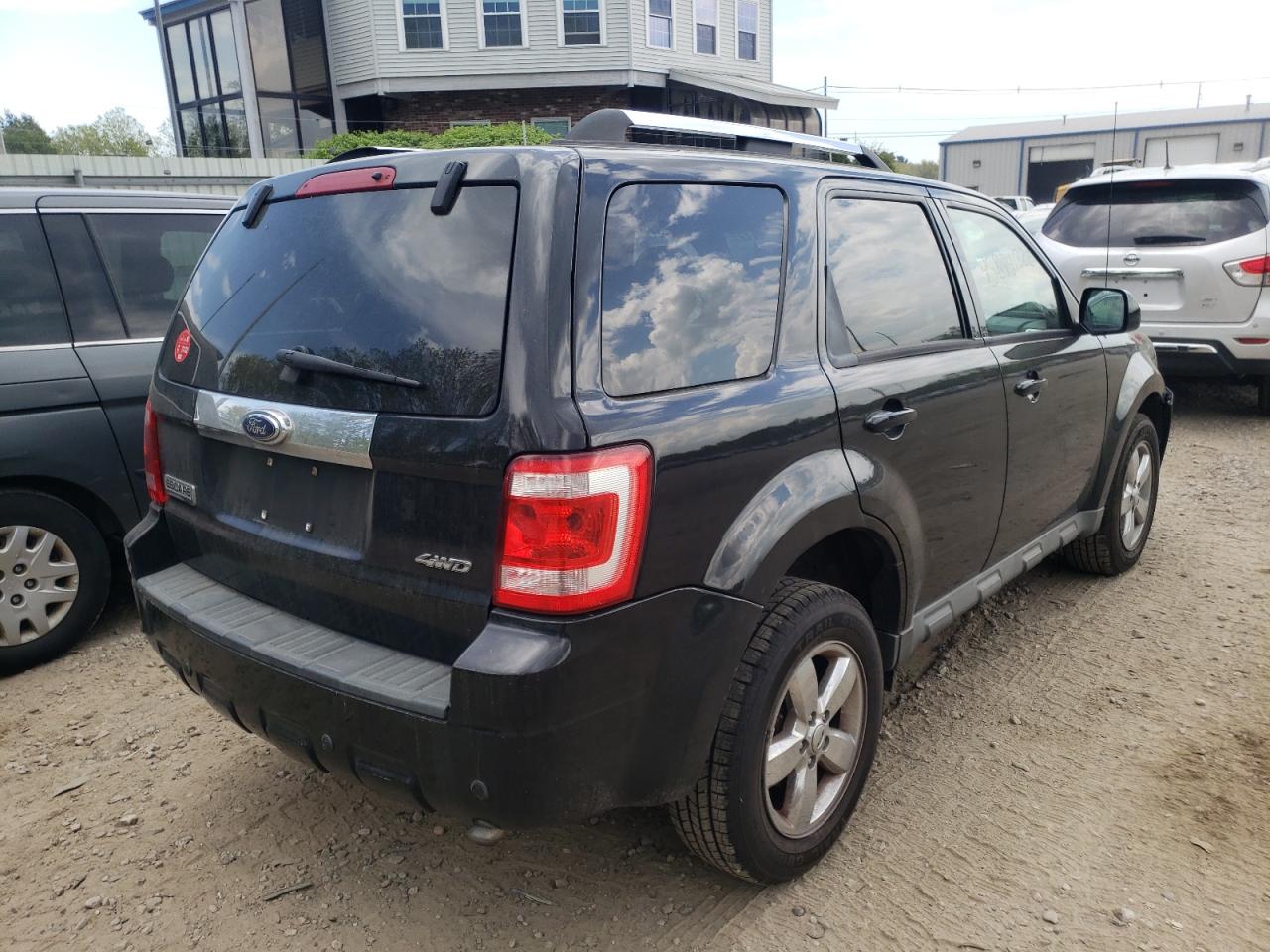 Photo 4 from auction – 2009 FORD ESCAPE LIM with VIN 1FMCU94G29KC33906