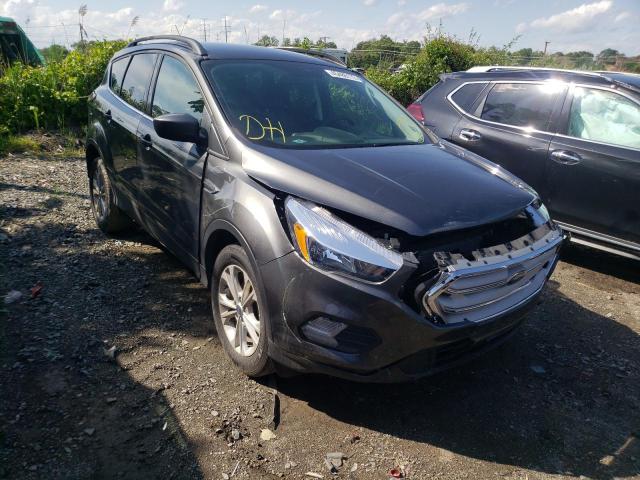 FORD ESCAPE SE 2018 with VIN 1FMCU0GD9JUC29454 - Photo from auction