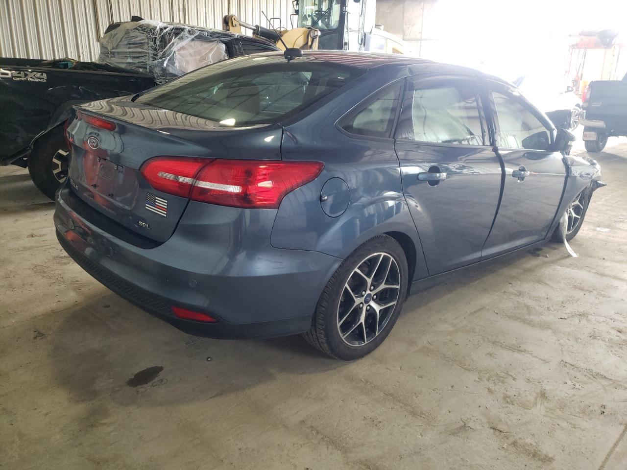 Photo 4 from auction – 2018 FORD FOCUS SEL with VIN 1FADP3H24JL306810