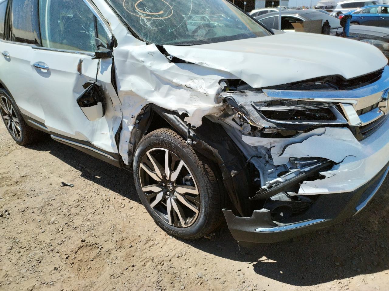 Photo 9 from auction – 2022 HONDA PILOT TOUR with VIN 5FNYF6H64NB026087