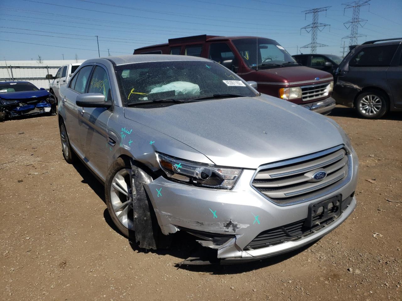 FORD TAURUS SEL 2016 with VIN 1FAHP2E8XGG119013 - Photo from auction