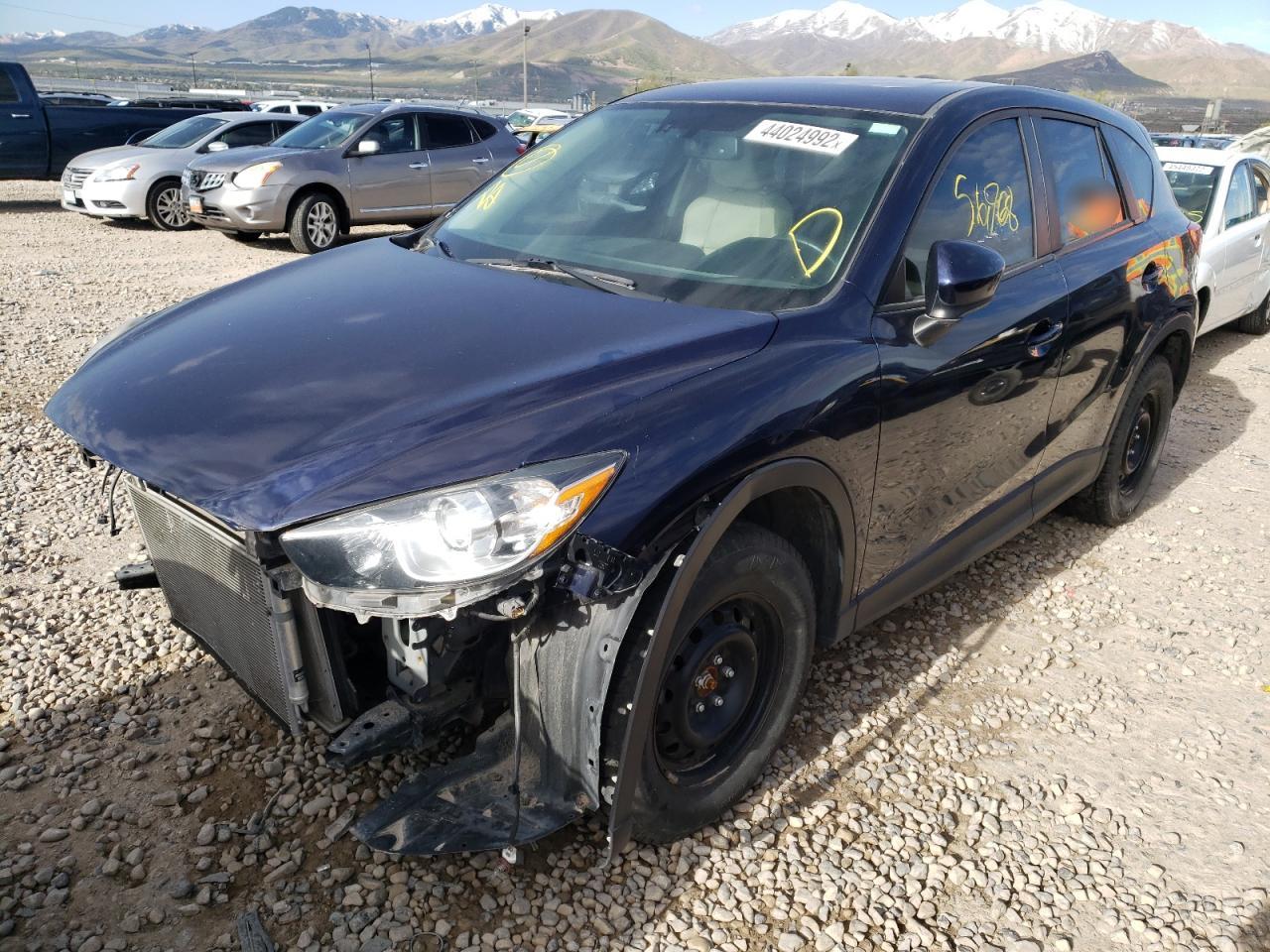 Photo 2 from auction – 2013 MAZDA CX-5 GT with VIN JM3KE4DE7D0165709