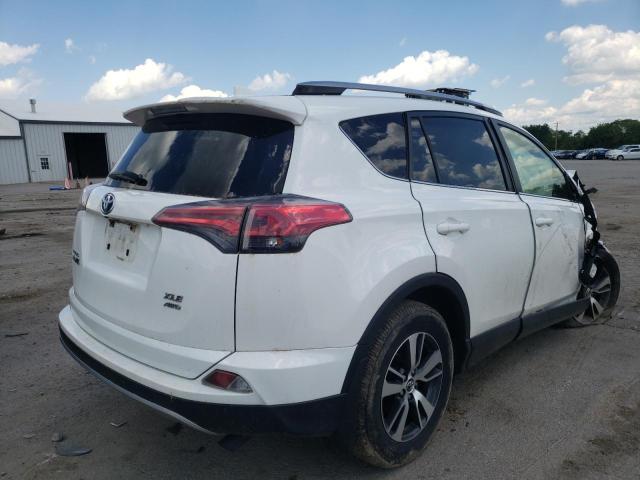 Photo 4 from auction – 2017 TOYOTA RAV4 XLE with VIN JTMRFREV3HJ700857