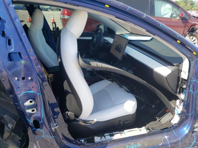 Photo 5 from auction – 2021 TESLA MODEL 3 with VIN 5YJ3E1ECXMF028287