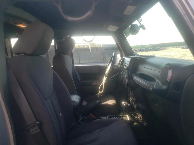 Photo 5 from auction – 2013 JEEP WRANGLER U with VIN 1C4BJWDG9DL673907