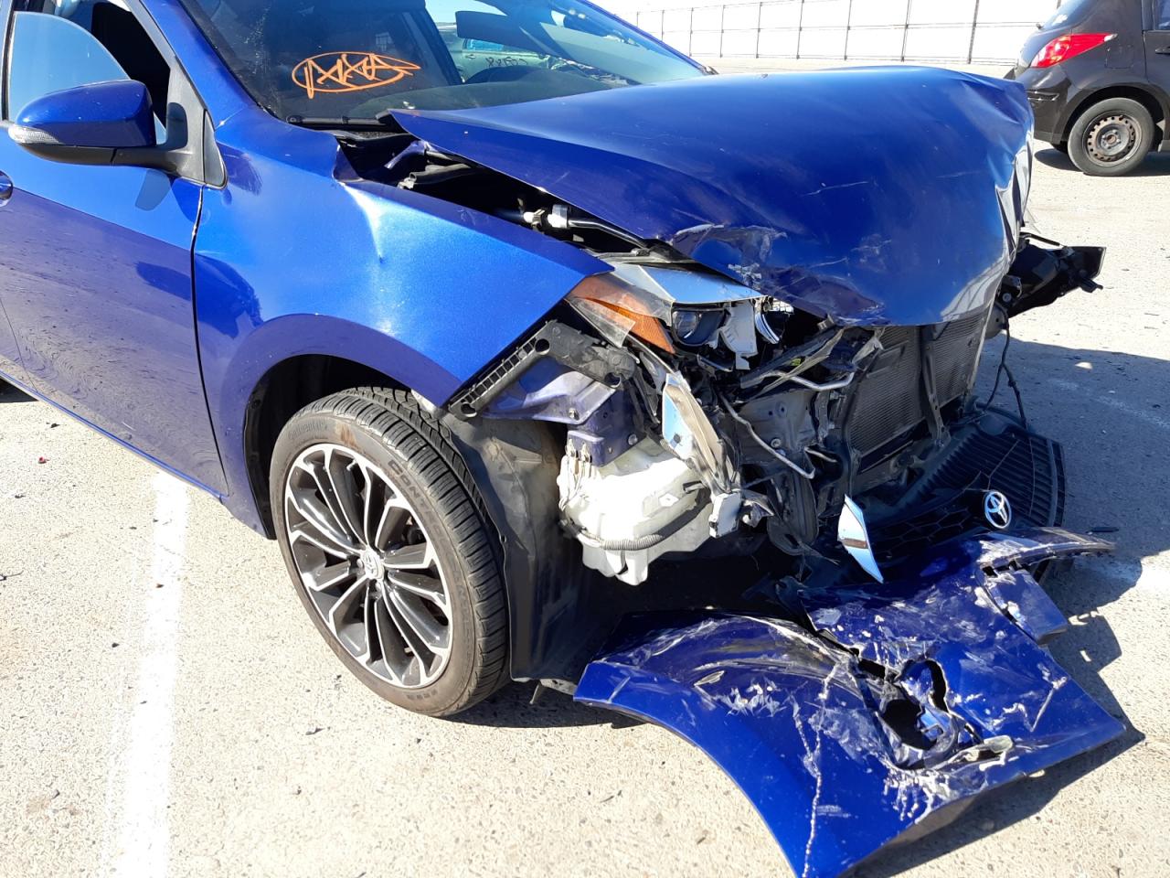 Photo 9 from auction – 2014 TOYOTA COROLLA L with VIN 5YFBURHE4EP091286