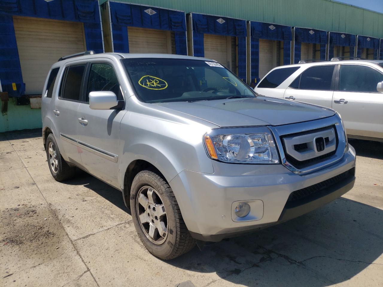 HONDA PILOT TOUR 2011 with VIN 5FNYF4H92BB004714 - Photo from auction