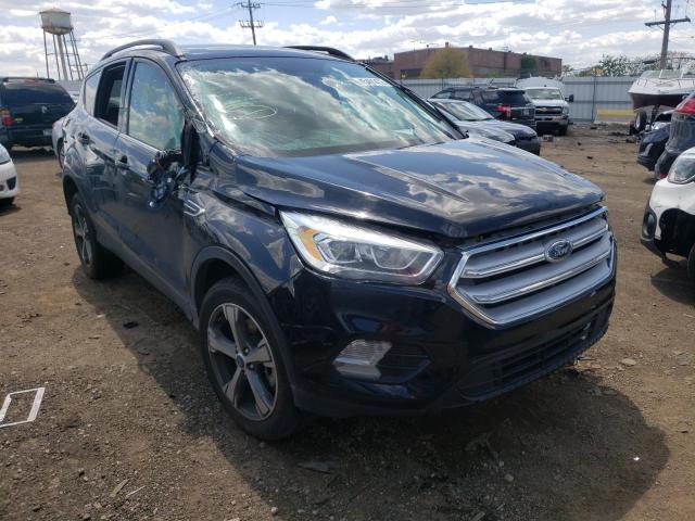 FORD ESCAPE SE 2017 with VIN 1FMCU9GD1HUE76563 - Photo from auction