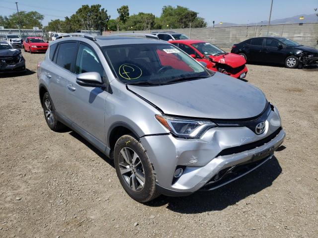 TOYOTA RAV4 XLE 2016 with VIN 2T3WFREV0GW253178 - Photo from auction