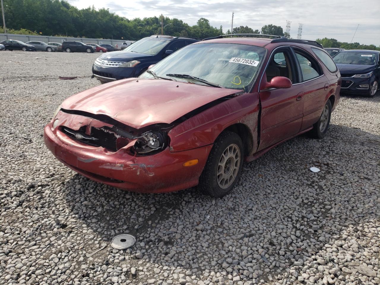 Photo 2 from auction – 1999 FORD TAURUS SE with VIN 1FAFP58S8XA158279