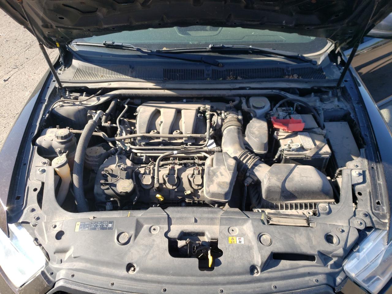 Photo 7 from auction – 2014 FORD TAURUS POL with VIN 1FAHP2MK4EG153569