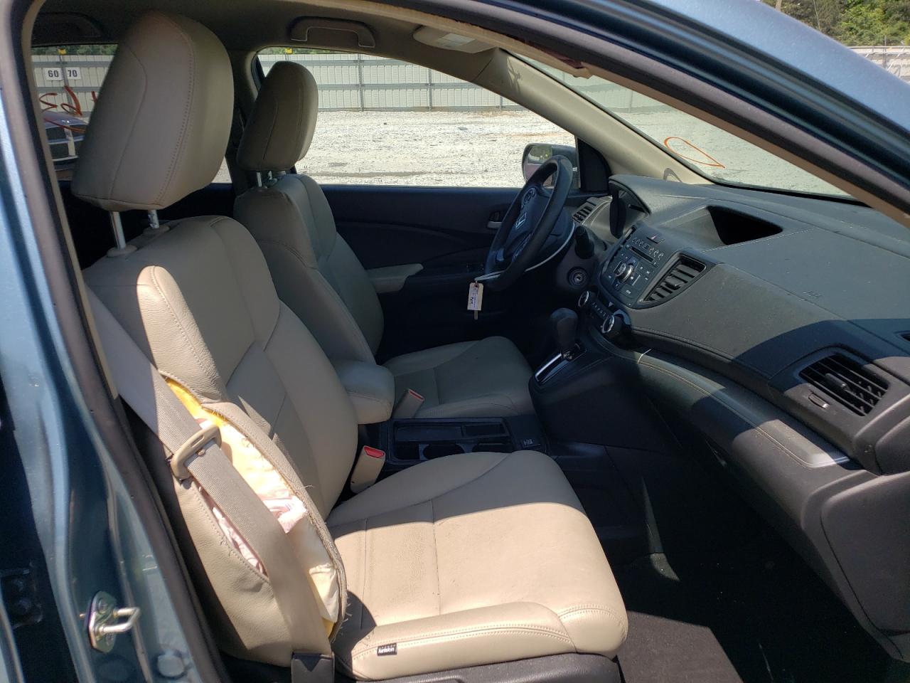 Photo 5 from auction – 2016 HONDA CR-V SE with VIN 2HKRM3H47GH521475