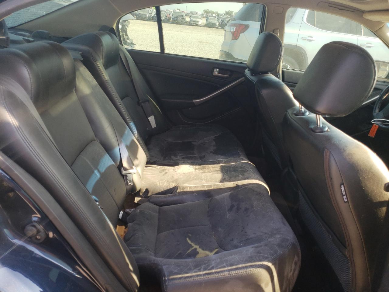Photo 18 from auction – 2004 INFINITI G35 with VIN JNKCV51E04M610600