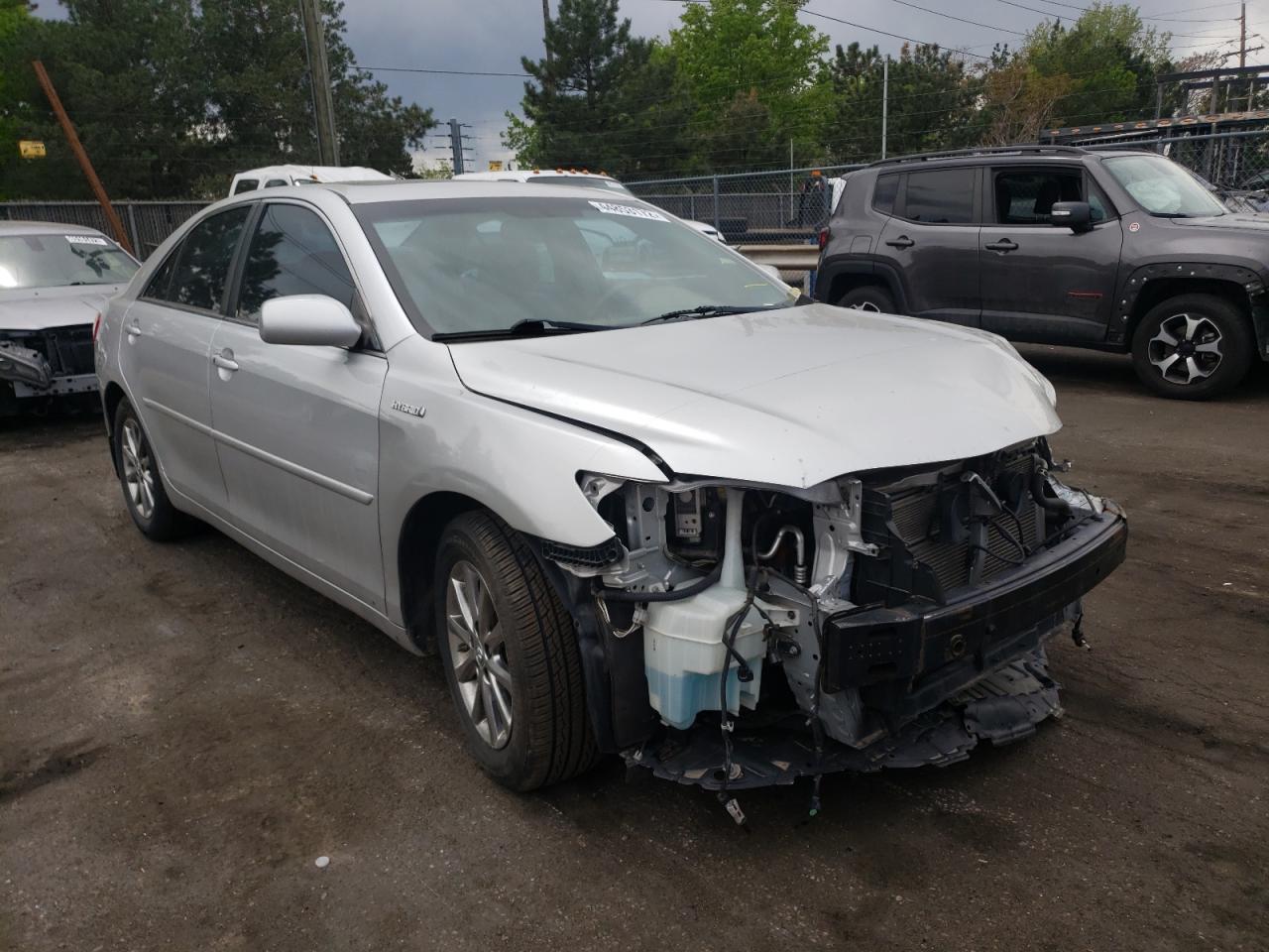 TOYOTA CAMRY HYBR 2011 with VIN 4T1BB3EK5BU143564 - Photo from auction