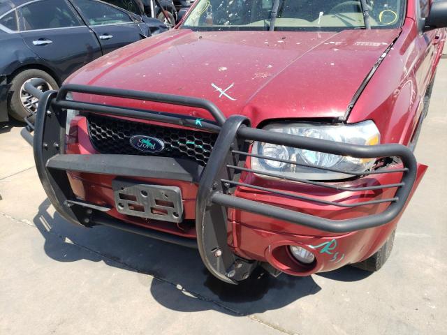 Photo 9 from auction – 2007 FORD ESCAPE LIM with VIN 1FMYU04117KA25834