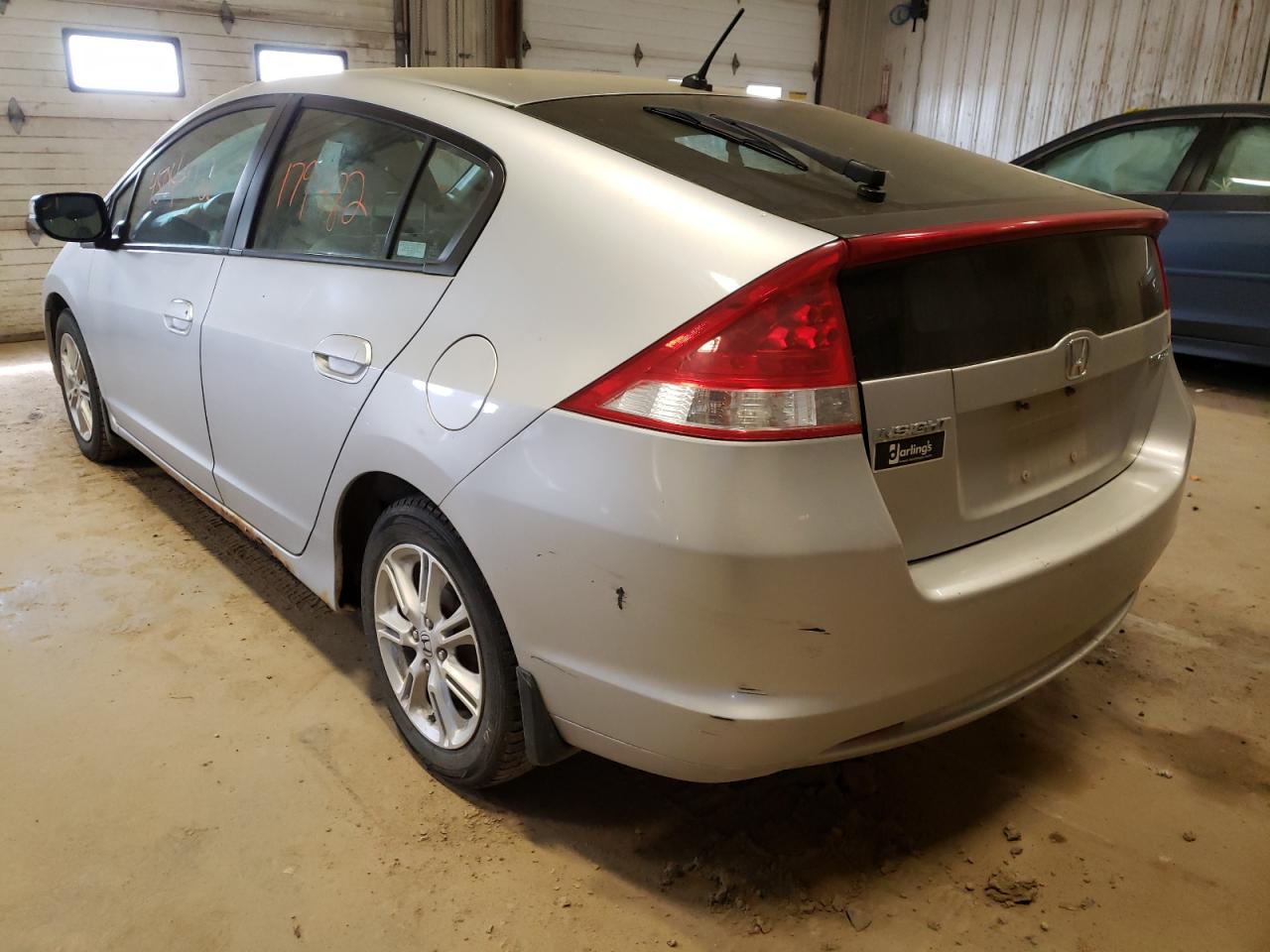 Photo 3 from auction – 2010 HONDA INSIGHT EX with VIN JHMZE2H72AS035763
