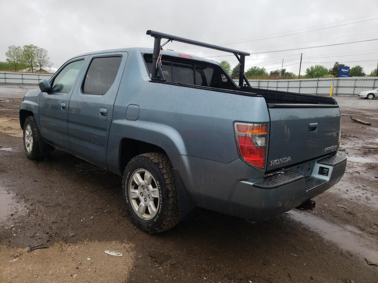 Photo 16 from auction – 2005 HONDA RIDGELINE with VIN 2HJYK16486H573614