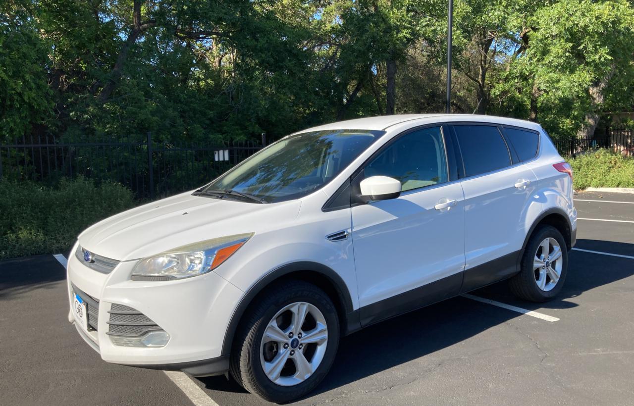 Photo 2 from auction – 2013 FORD ESCAPE SE with VIN 1FMCU9G92DUD41503