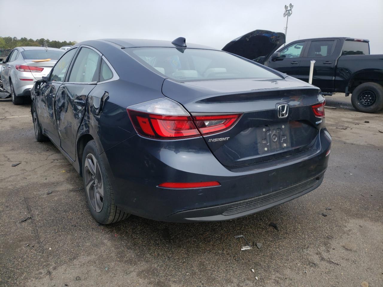 Photo 16 from auction – 2019 HONDA INSIGHT EX with VIN 19XZE4F50KE011156