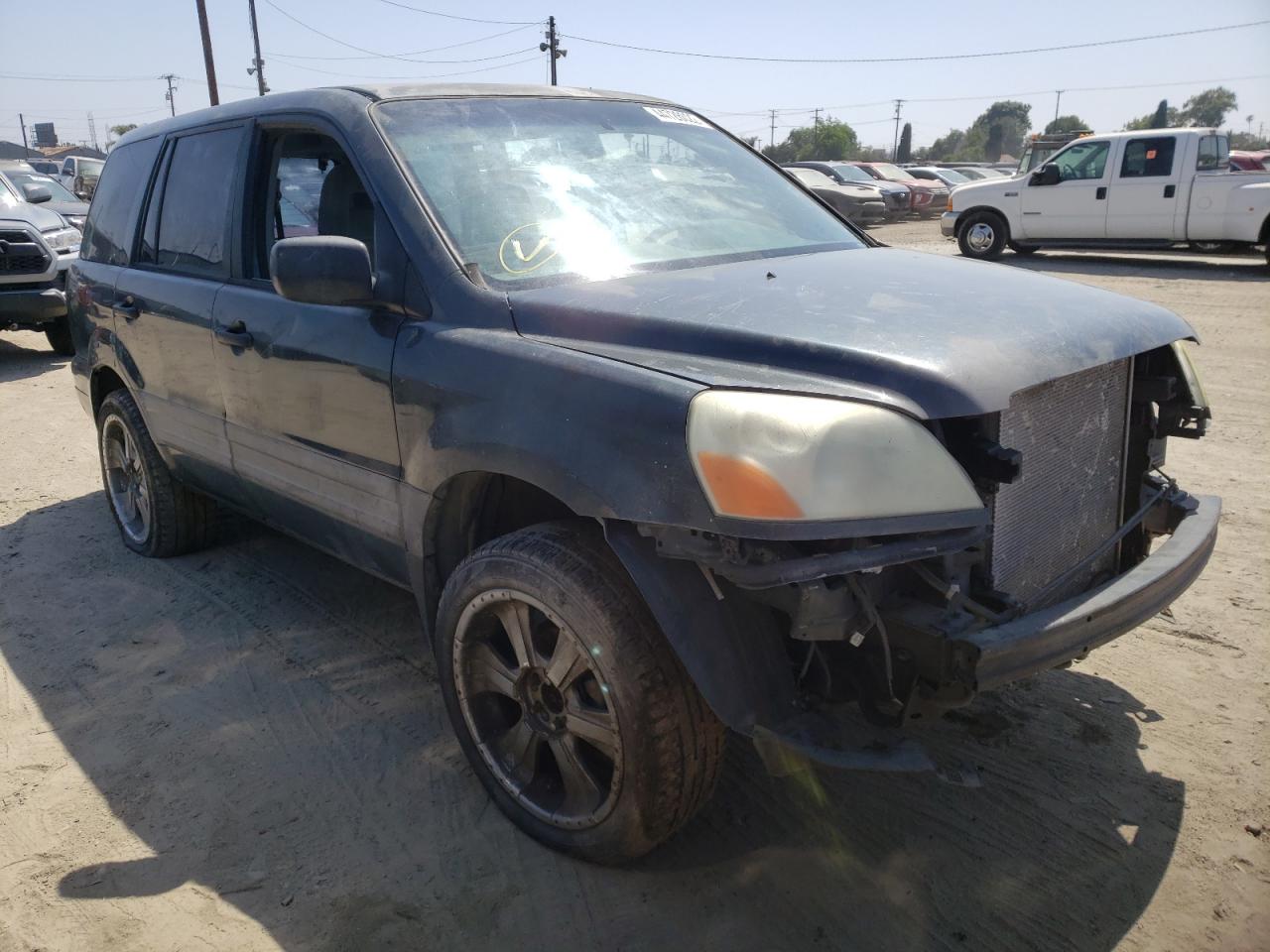 HONDA PILOT LX 2004 with VIN 2HKYF181X4H622490 - Photo from auction