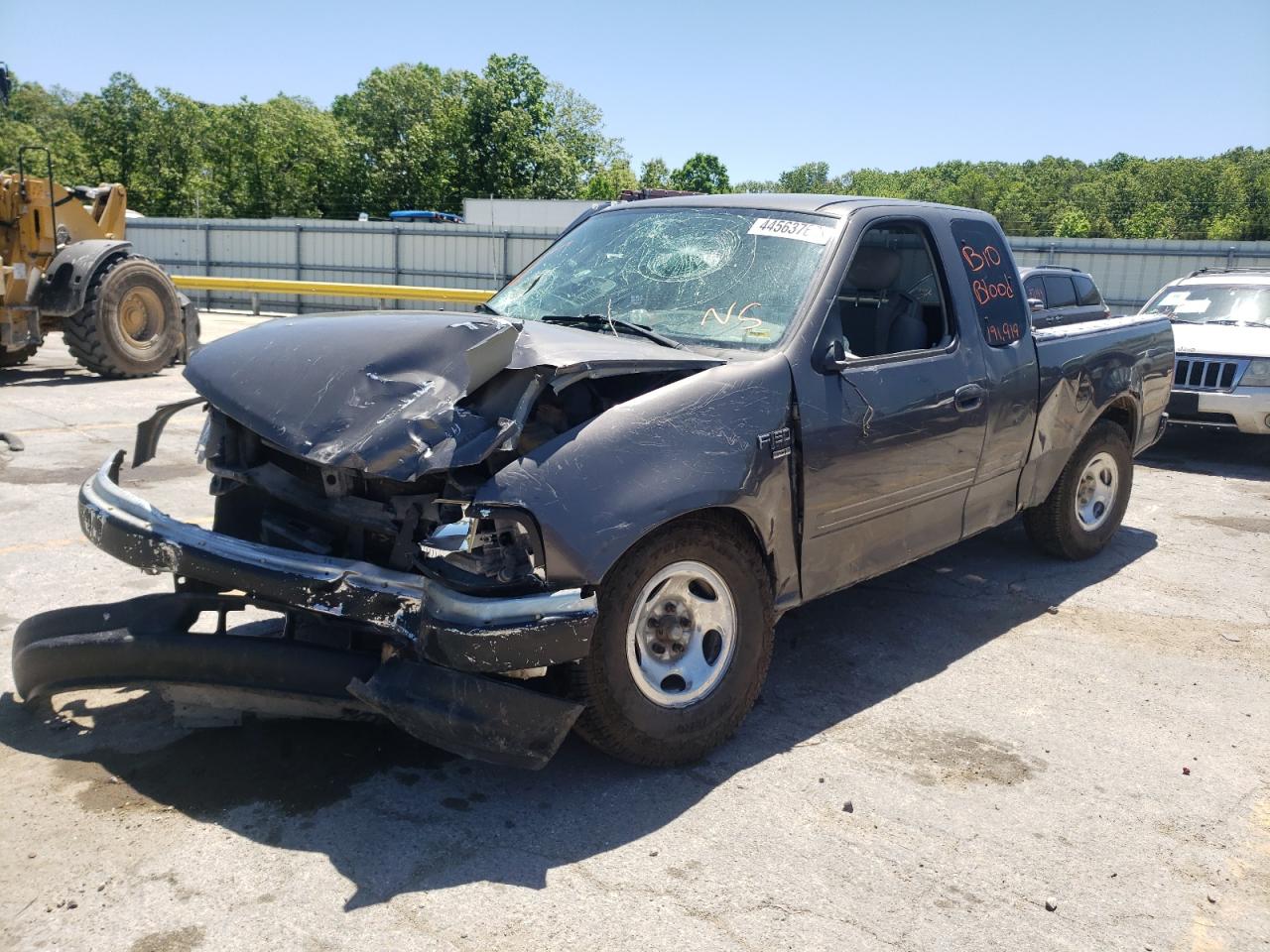 Photo 2 from auction – 2003 FORD F150 with VIN 1FTRX17W73KB06893