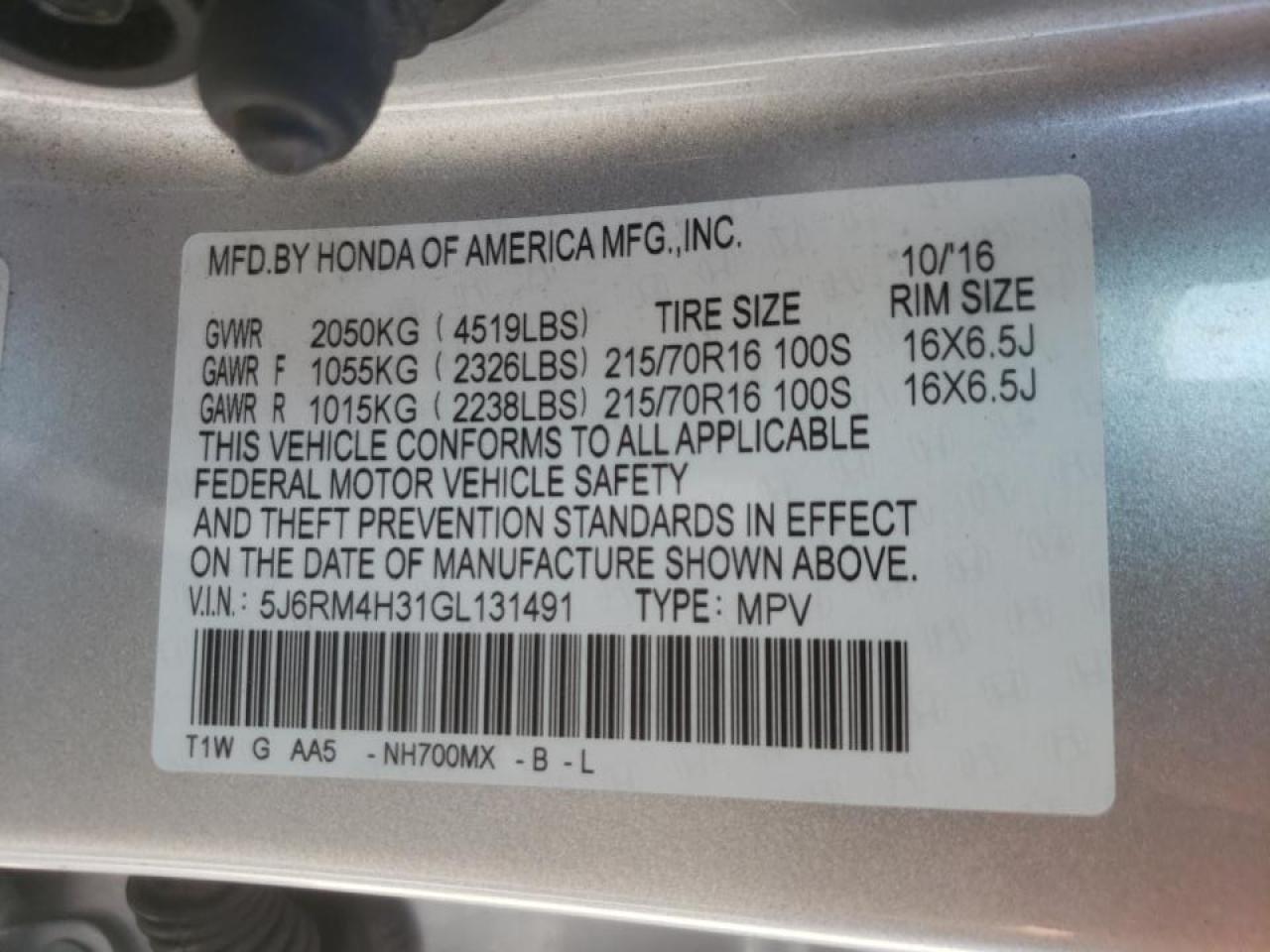Photo 10 from auction – 2016 HONDA CR-V LX with VIN 5J6RM4H31GL131491