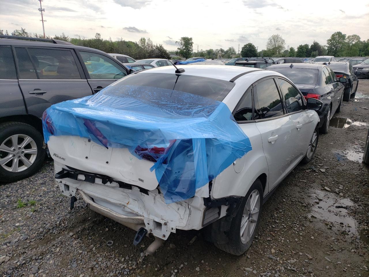 Photo 4 from auction – 2018 FORD FOCUS SE with VIN 1FADP3F20JL231199