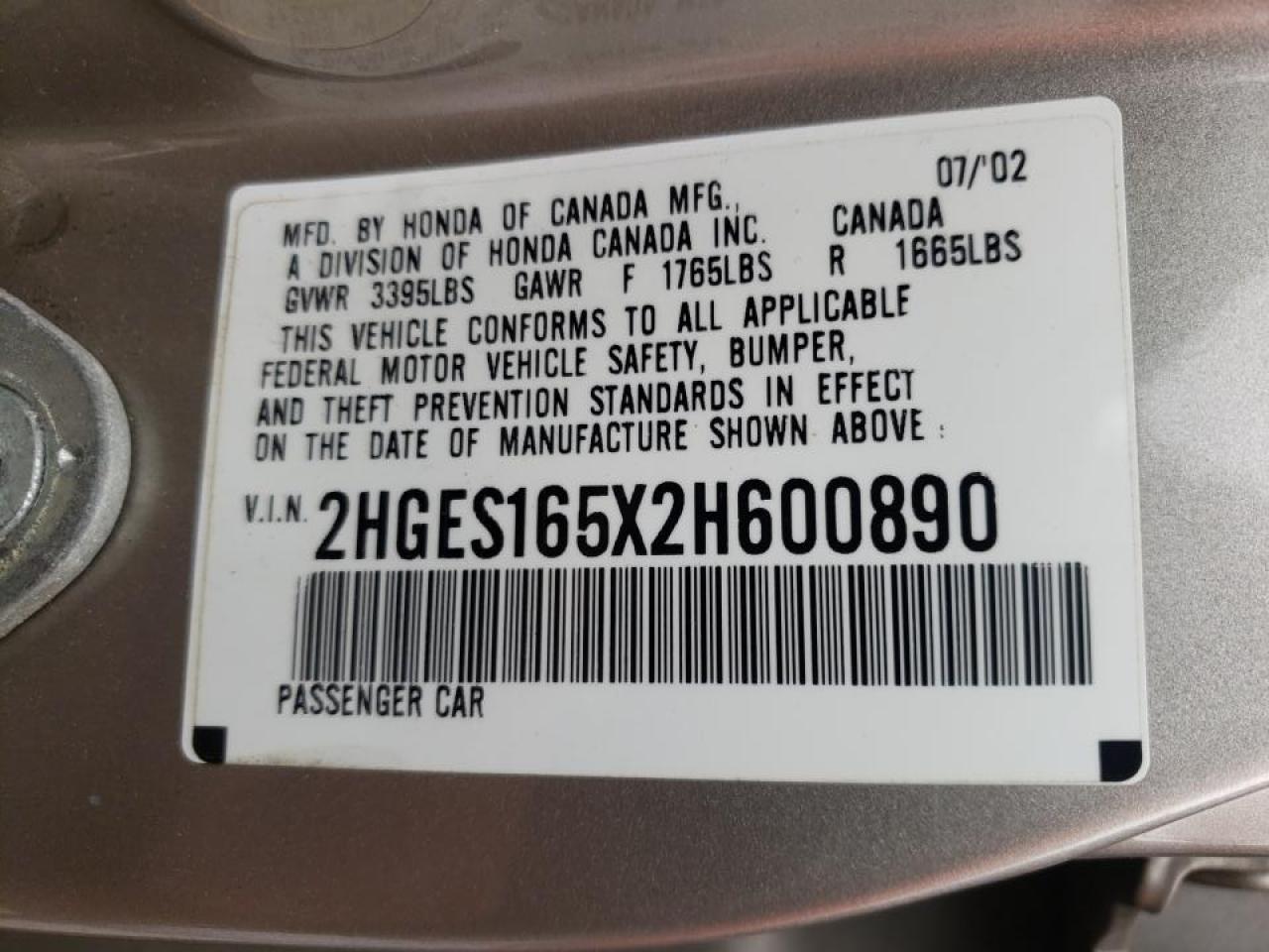 Photo 20 from auction – 2002 HONDA CIVIC LX with VIN 2HGES165X2H600890