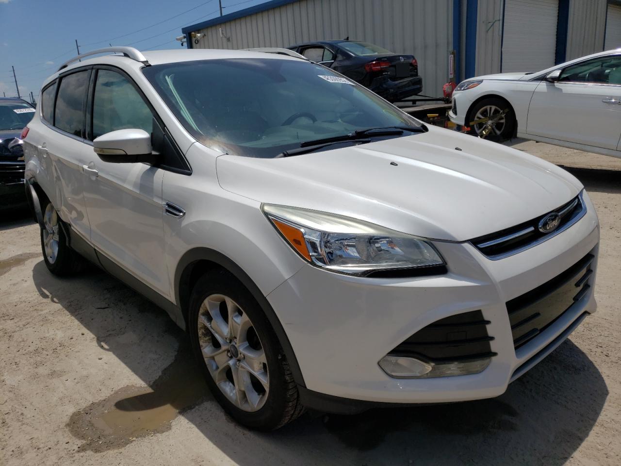 FORD ESCAPE TIT 2015 with VIN 1FMCU0J96FUC01560 - Photo from auction