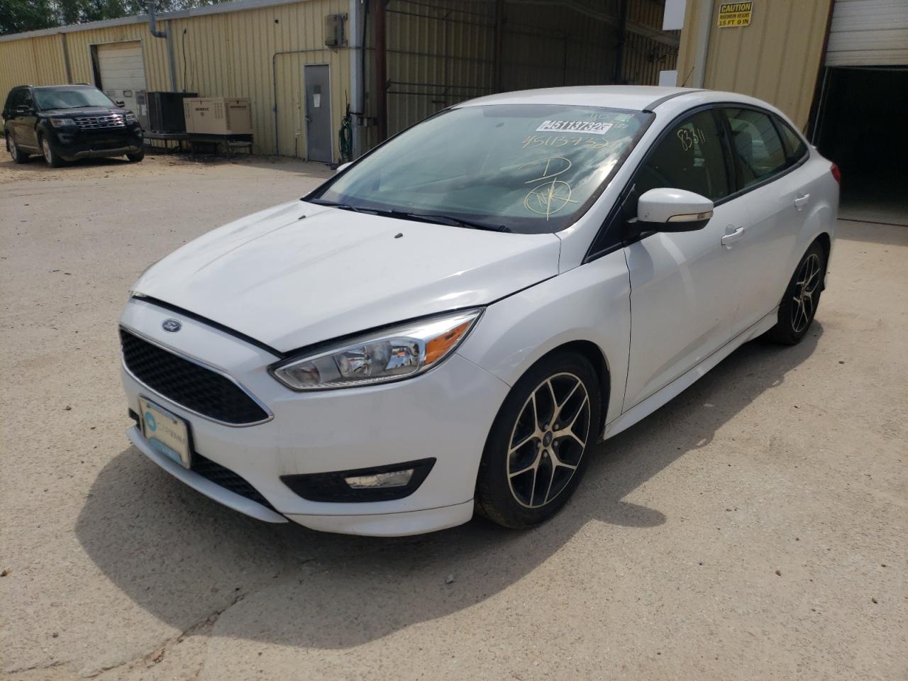 Photo 2 from auction – 2015 FORD FOCUS SE with VIN 1FADP3F2XFL354077