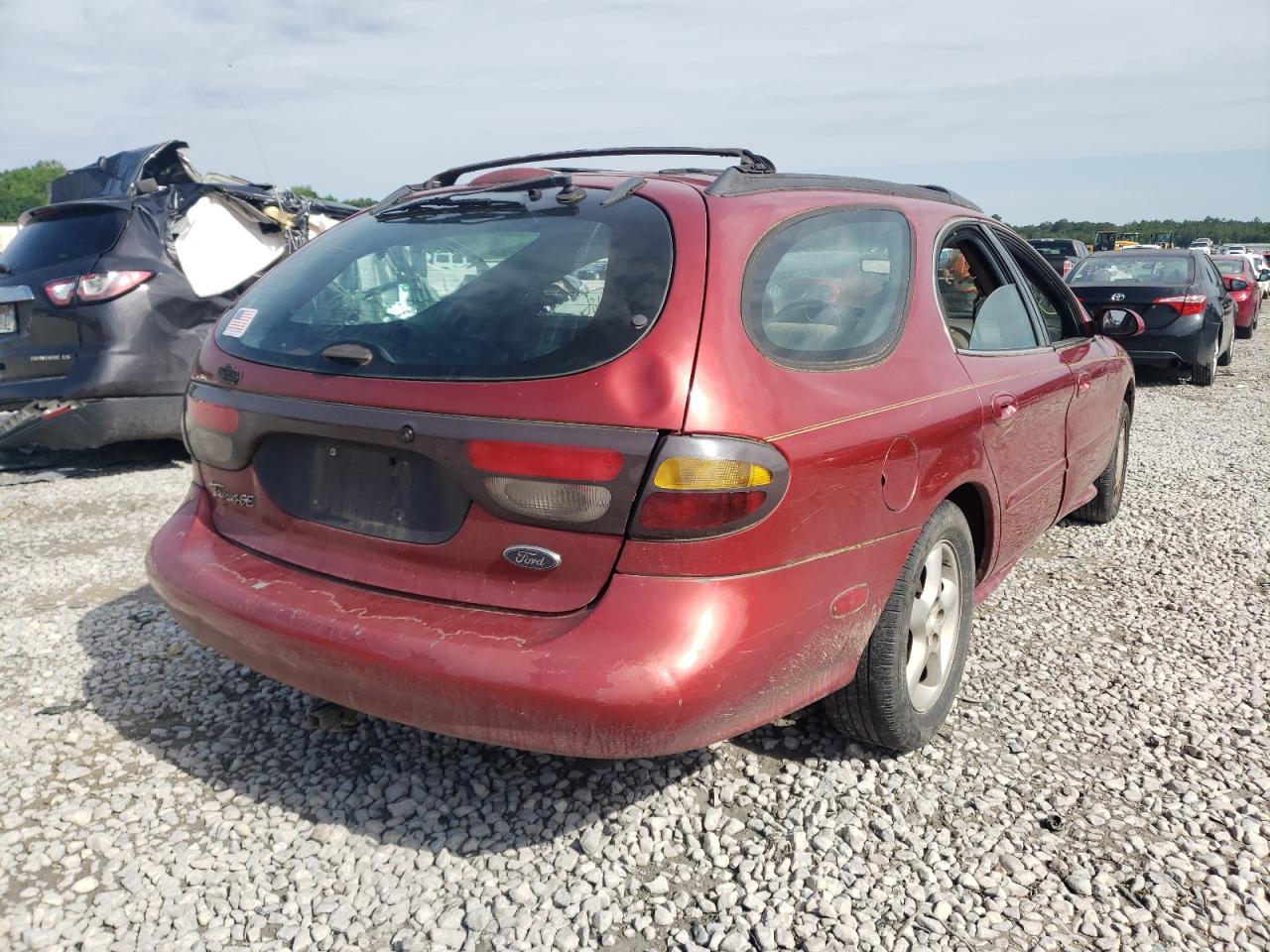 Photo 4 from auction – 1999 FORD TAURUS SE with VIN 1FAFP58S8XA158279