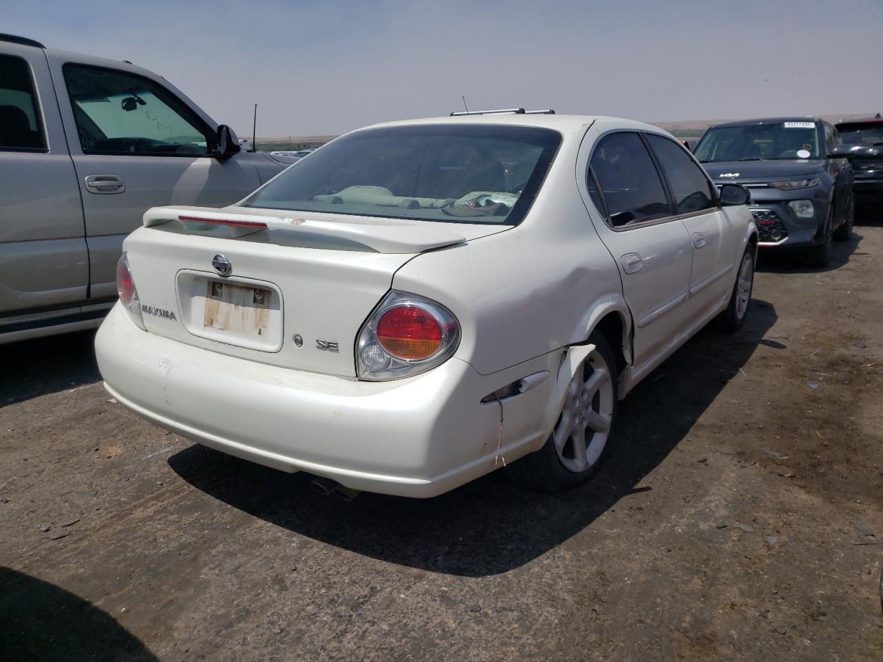 Photo 9 from auction – 2002 NISSAN MAXIMA GLE with VIN JN1DA31D32T428778
