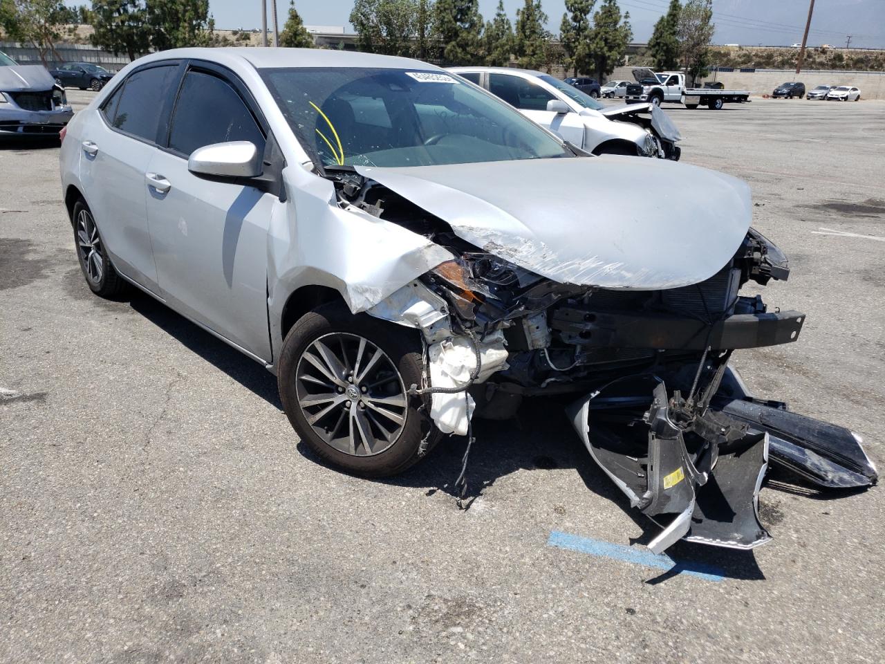 TOYOTA COROLLA L 2017 with VIN 5YFBURHE6HP611301 - Photo from auction