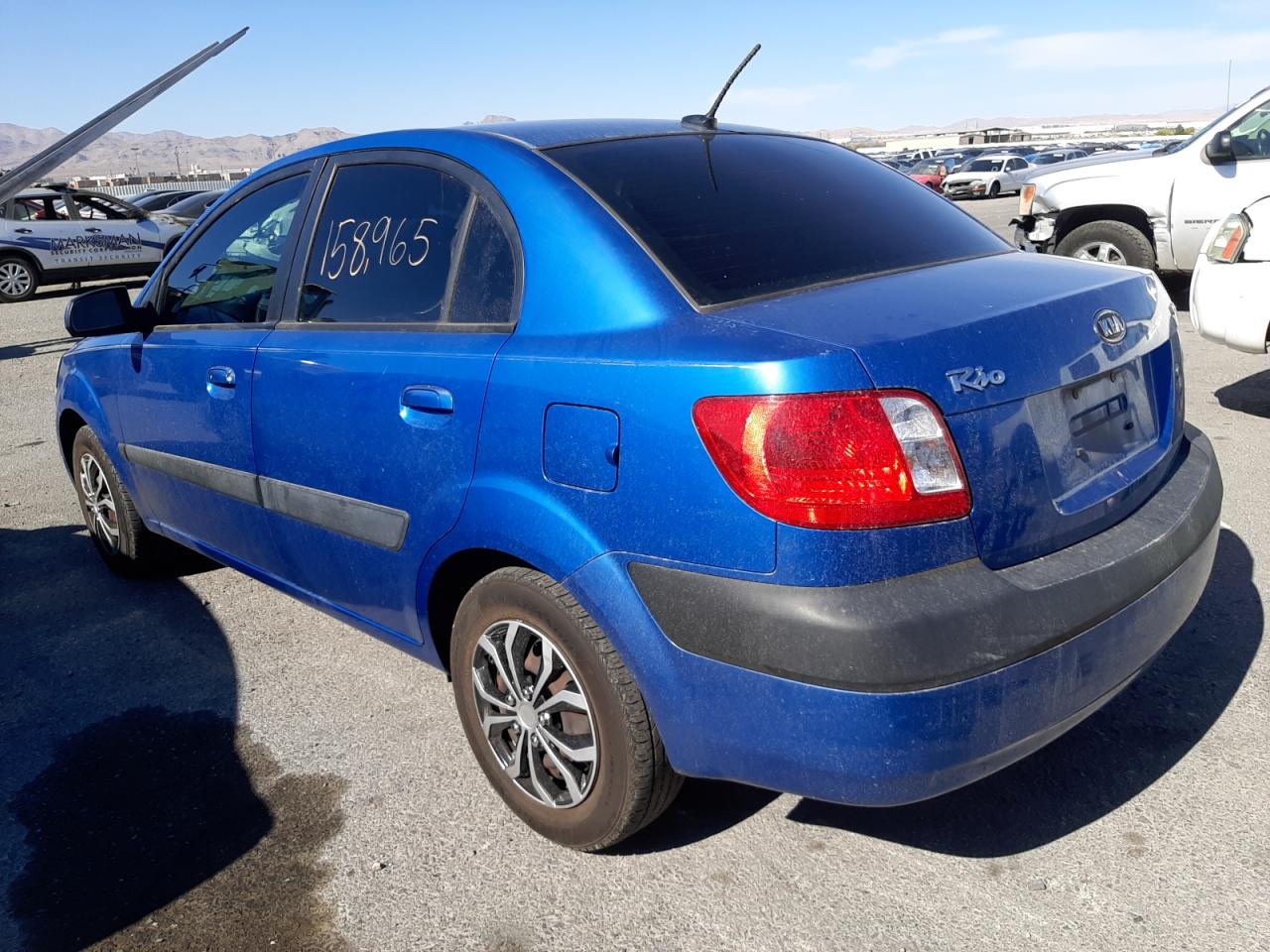 Photo 3 from auction – 2009 KIA RIO BASE with VIN KNADE223196490073