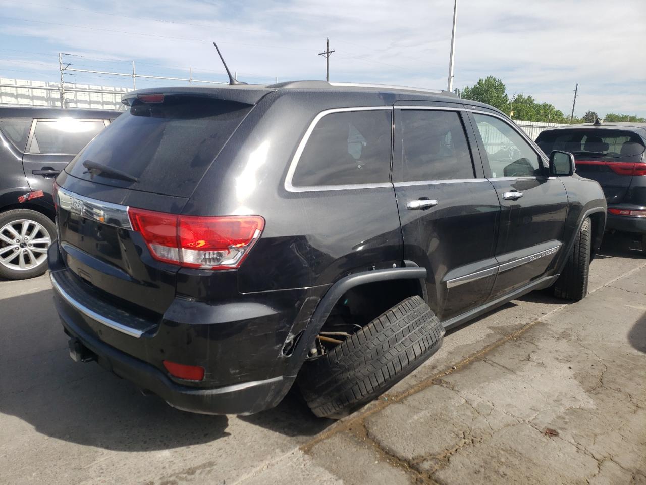 Photo 4 from auction – 2012 JEEP GRAND CHER with VIN 1C4RJFCG3CC343727