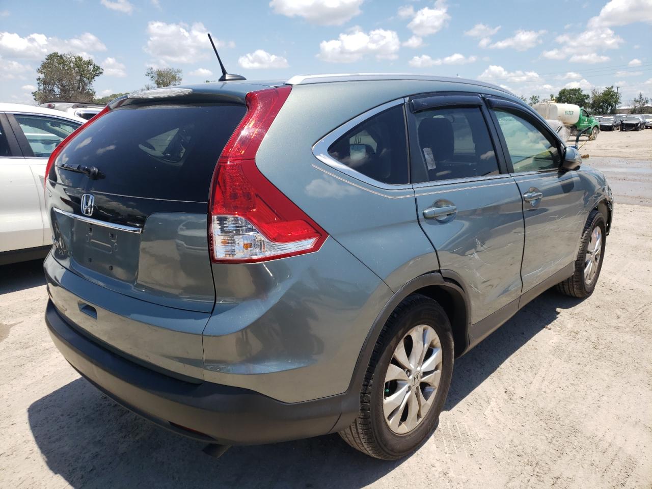 Photo 4 from auction – 2012 HONDA CR-V EXL with VIN JHLRM3H70CC003257