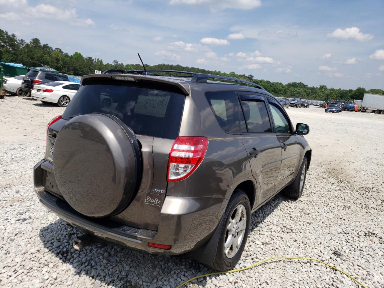Photo 4 from auction – 2011 TOYOTA RAV4 with VIN 2T3BK4DV0BW051092