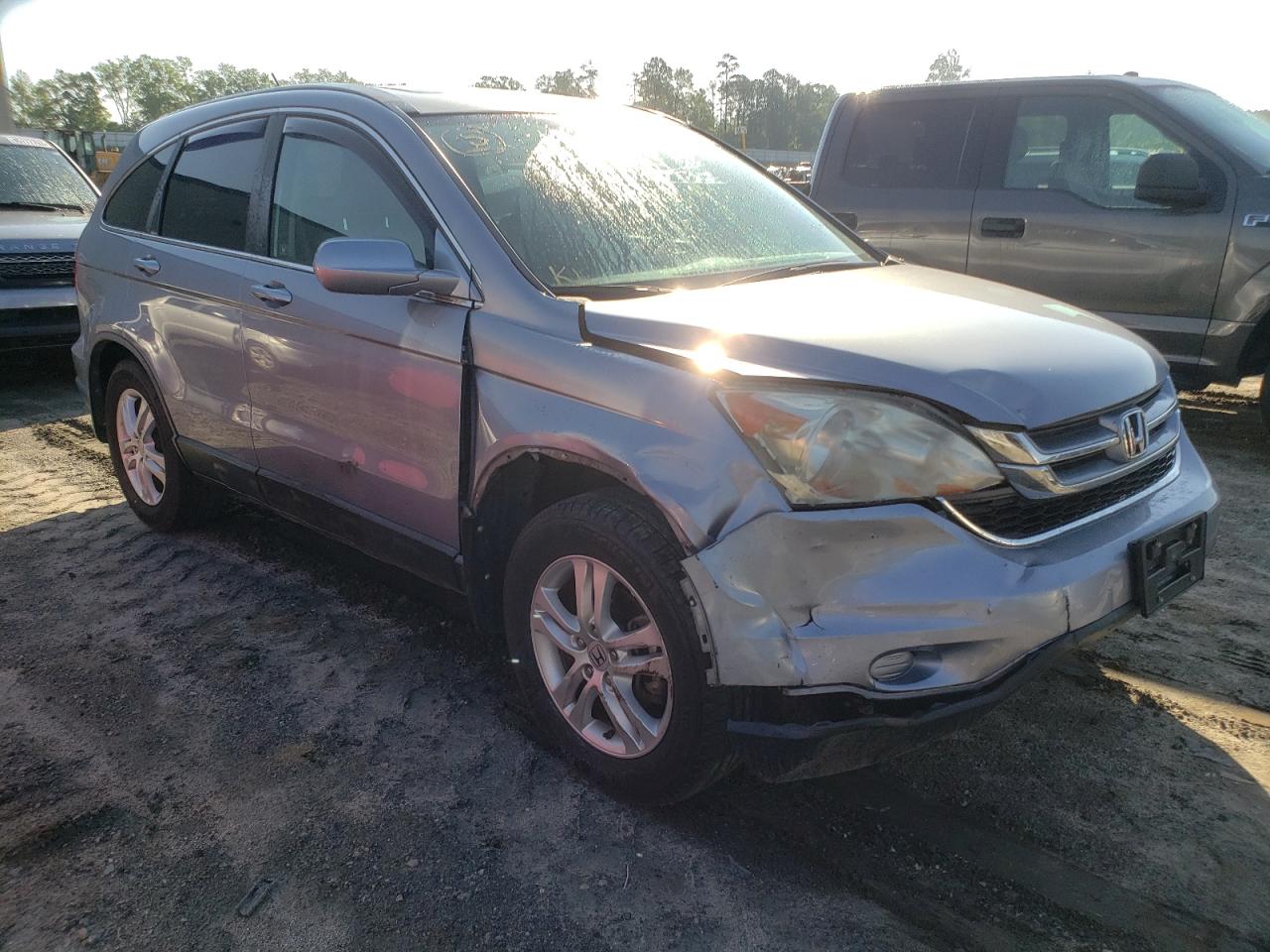 HONDA CR-V EXL 2011 with VIN 5J6RE3H76BL018641 - Photo from auction