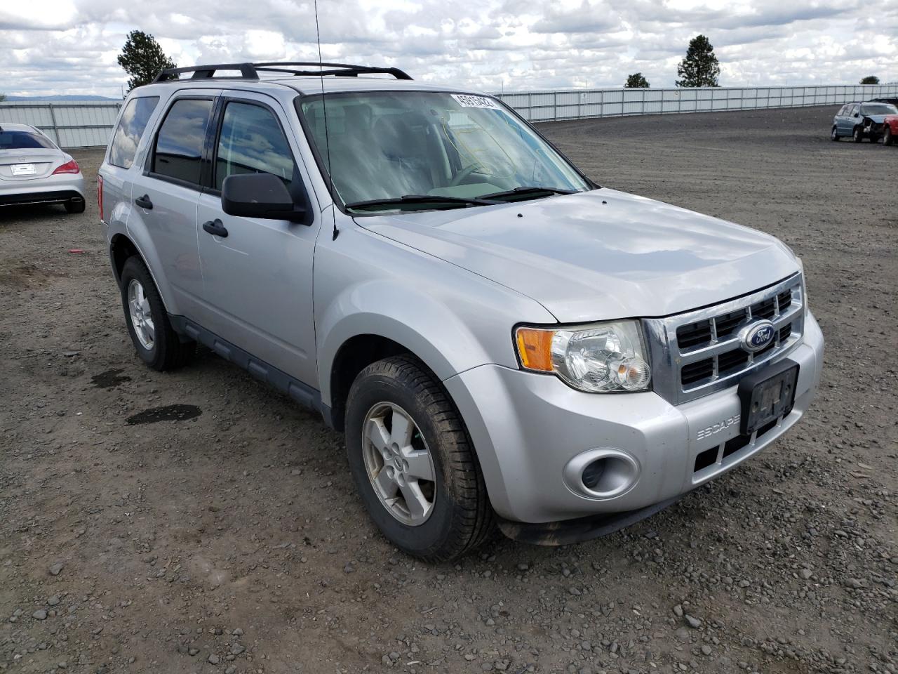FORD ESCAPE XLS 2010 with VIN 1FMCU9C74AKD34824 - Photo from auction