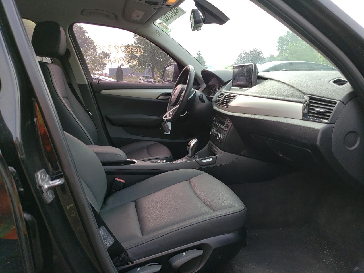 Photo 5 from auction – 2015 BMW X1 SDRIVE2 with VIN WBAVM1C54FV318655