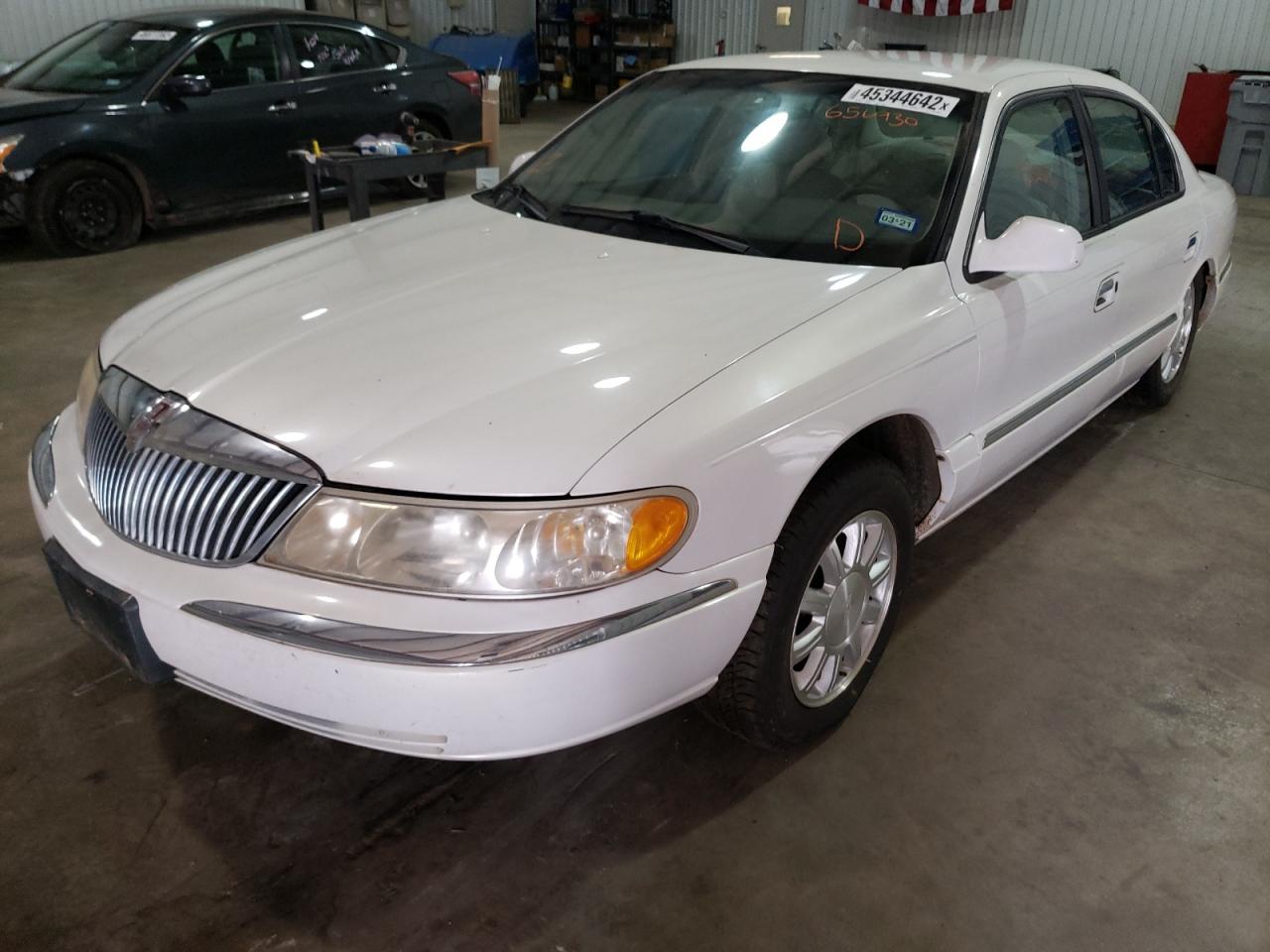 Photo 2 from auction – 2001 LINCOLN CONTINENTA with VIN 1LNHM97V81Y656930
