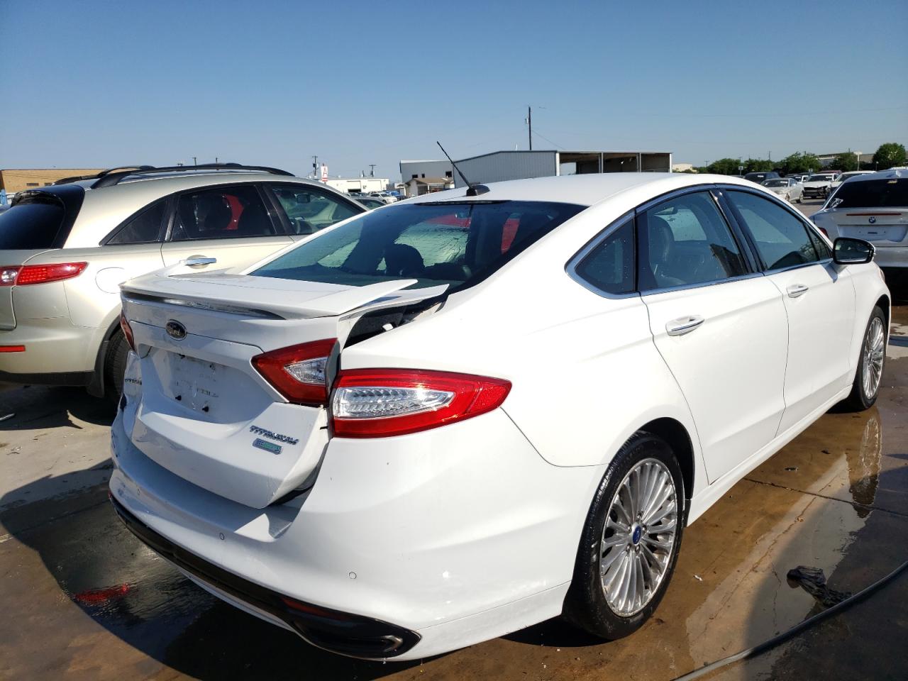 Photo 4 from auction – 2016 FORD FUSION TIT with VIN 3FA6P0K96GR250487