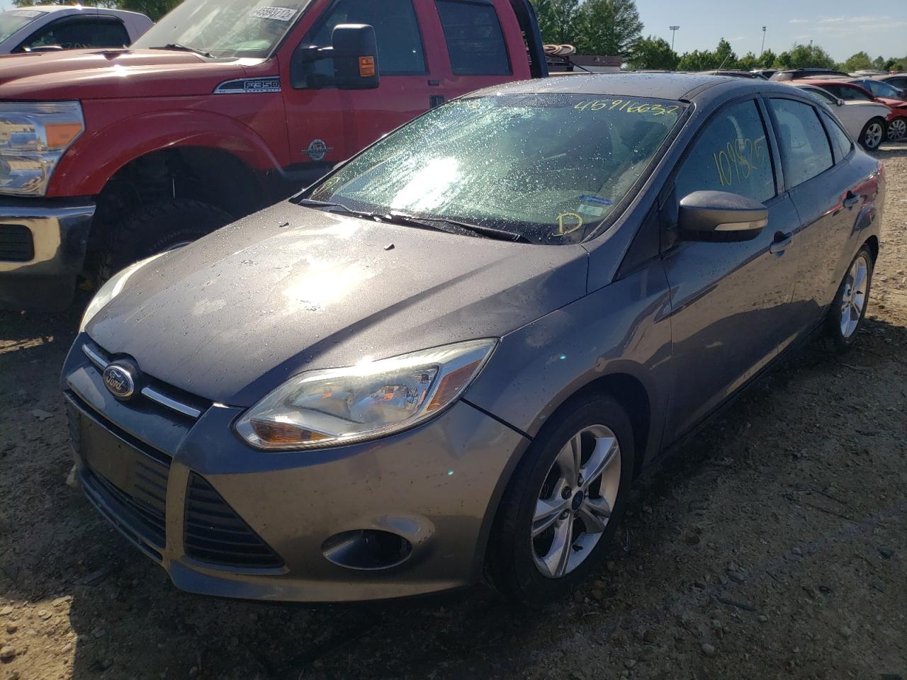 Photo 2 from auction – 2014 FORD FOCUS SE with VIN 1FADP3F28EL167757