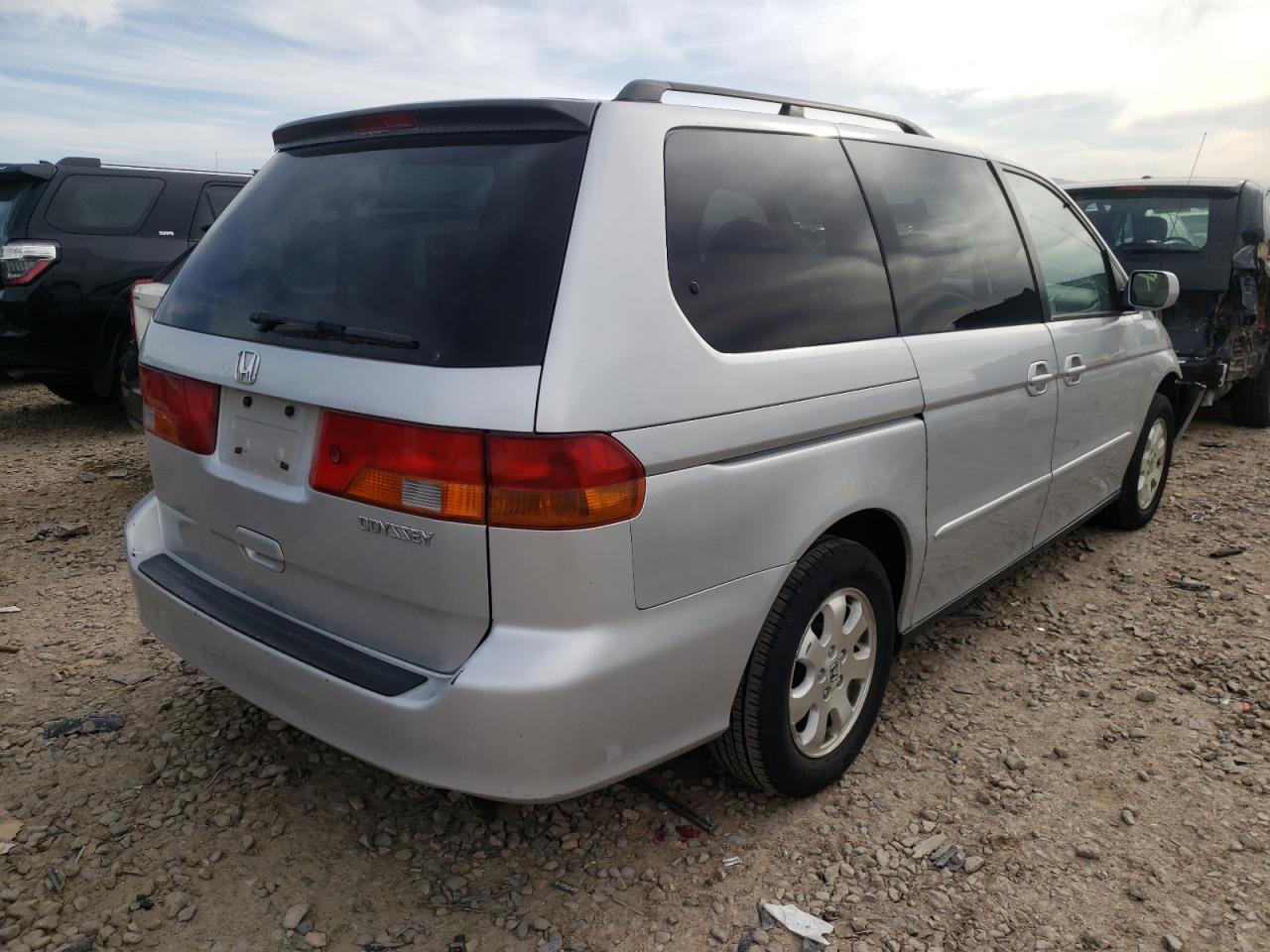 Photo 14 from auction – 2002 HONDA ODYSSEY EX with VIN 2HKRL18042H520409