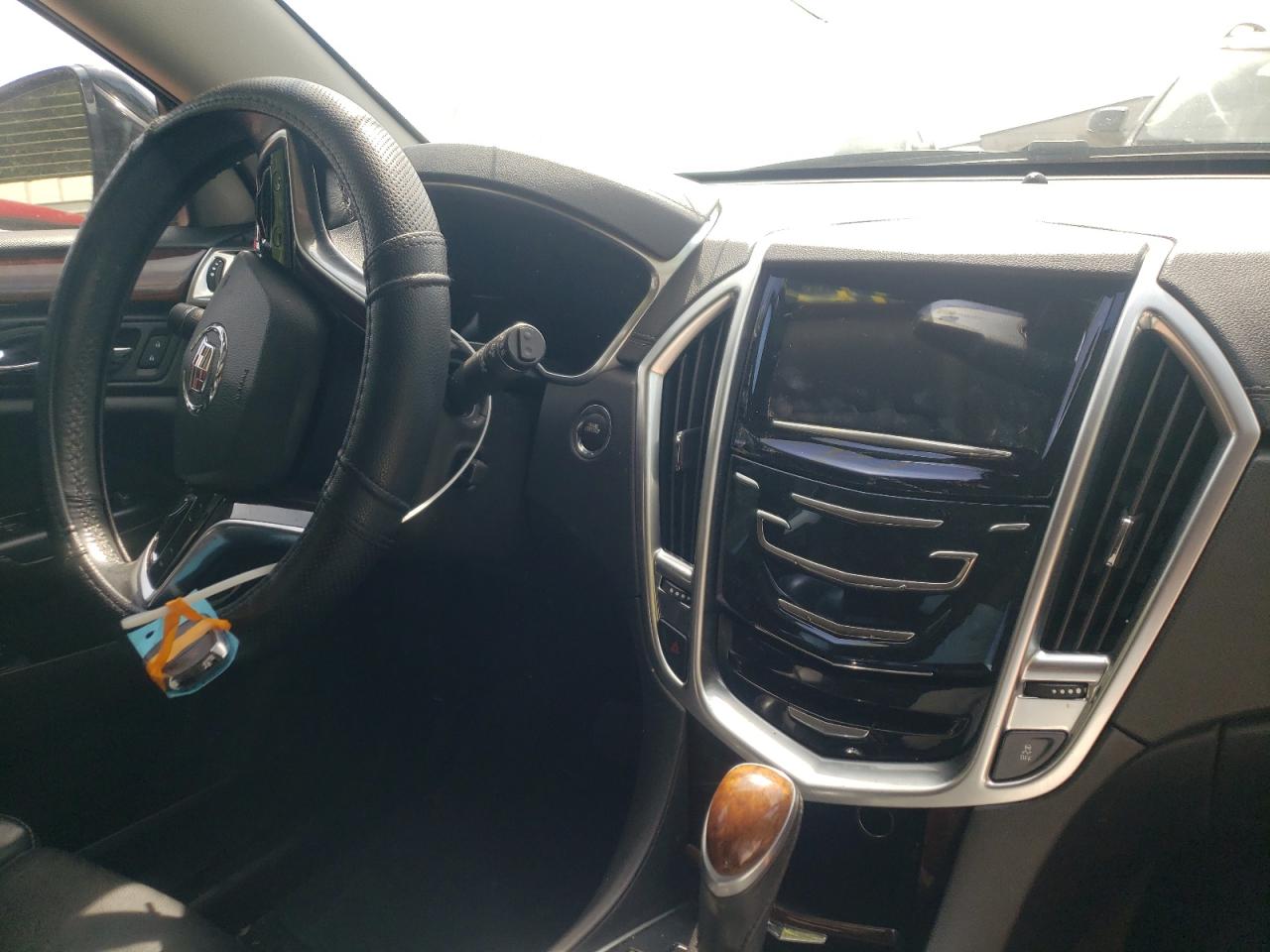 Photo 9 from auction – 2015 CADILLAC SRX LUXURY with VIN 3GYFNBE35FS529935