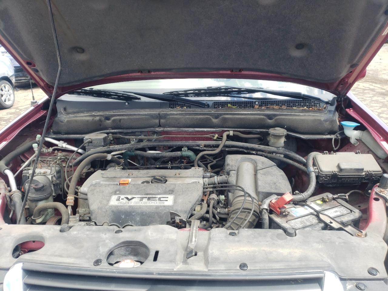 Photo 11 from auction – 2004 HONDA CR-V EX with VIN JHLRD78884C043863